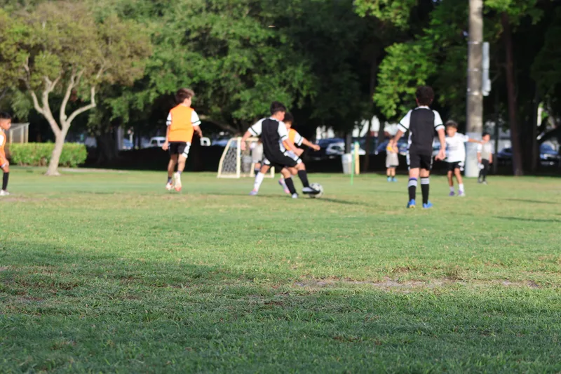 Players contest possession during a practice match